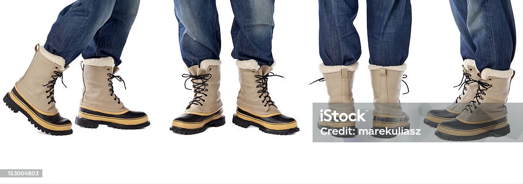 blue jeans y fundas de nieve - Foto de stock de Botas de trabajo libre de derechos