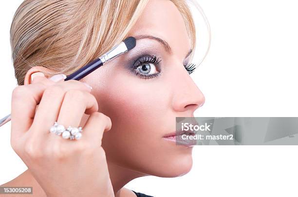 Nice Caucasian Model Applying Makeup With Brush Stock Photo - Download Image Now - Adult, Applying, Beautiful People