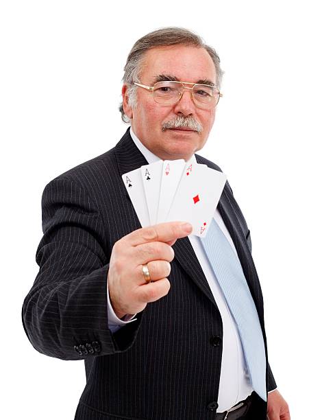 istock Senior man showing the four aces 153005250
