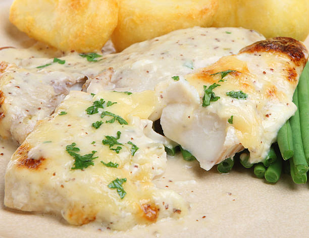 istock Haddock Fish Fillets Baked with Cheese Sauce 153005427