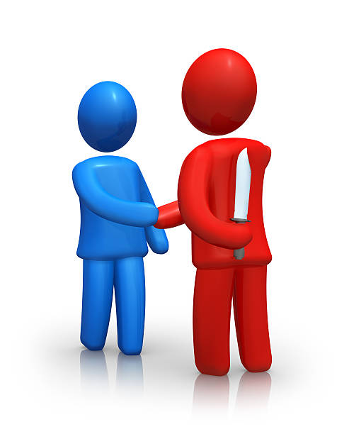 Knife Behind Back stock photo