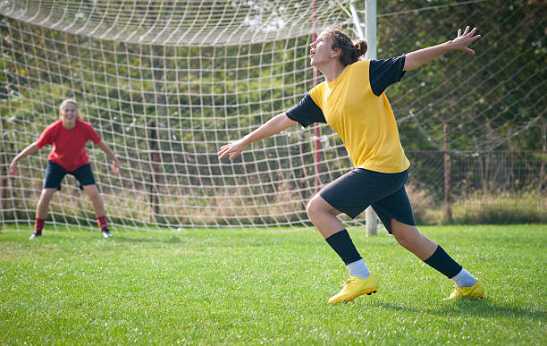 istock Girls playing soccer 153006053