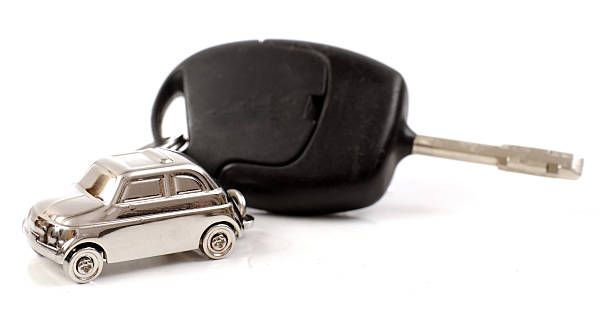 istock Car's key with miniature car 153006101