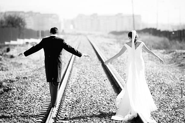 istock Just married couple on railway 153006209