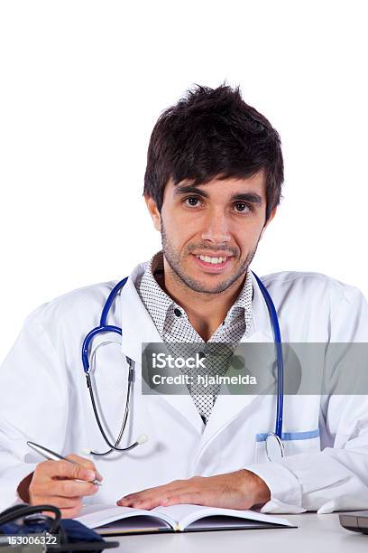 Foto de Frendly Jovem Médico No Seu Escritório e mais fotos de stock de Adulto - Adulto, Assistência, Autoconfiança