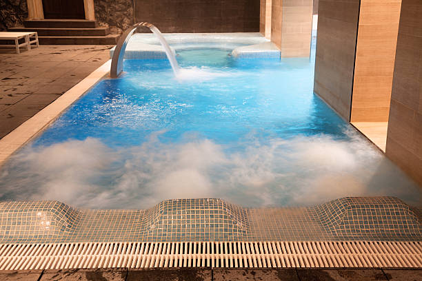 istock Waterfall jet in hot tub at spa 153006388