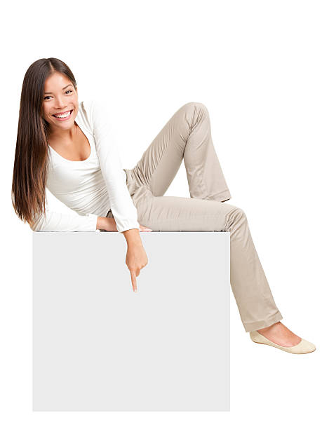 istock Woman sitting on / showing sign 153006445