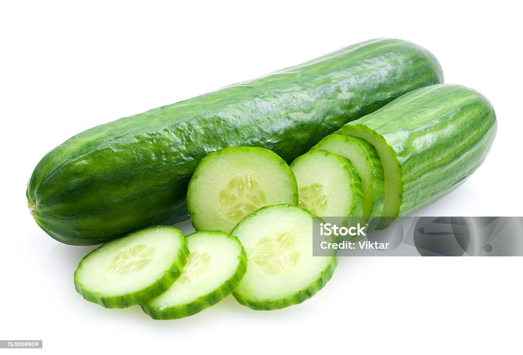 cucumbers fresh cucumbers with slices isolated on white background Cross Section Stock Photo