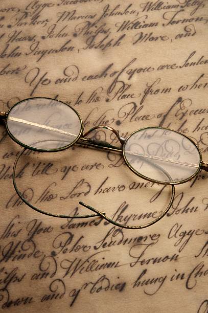 istock Old glasses on the vintage document 153009168