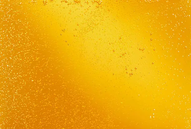 Gold beer in a glass texture