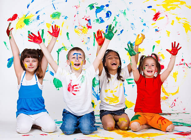 istock Kids with their palms and clothing painted 153009881