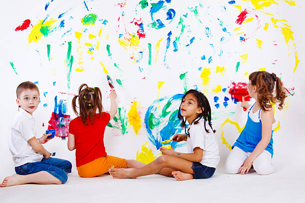 istock Kids painting the wall 153009890