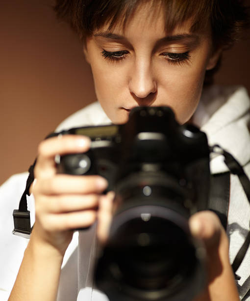 istock female photographer 153010238