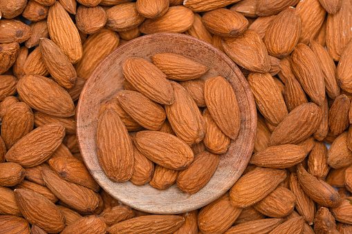 California brown almonds close up, brown wallpaper