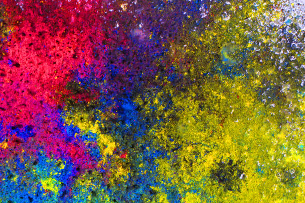 istock cyan, magenta, black and yellow colors texture 1530116046