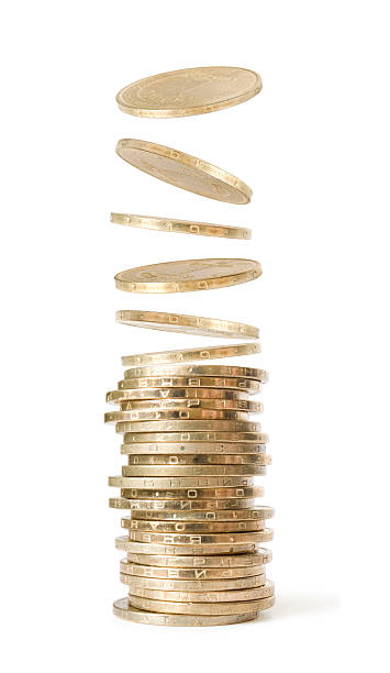 istock A pile of gold coins with a white background 153011978