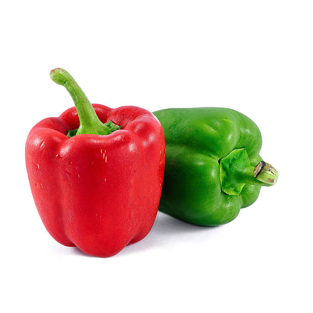 Red and green bell peppers isolated on white background Bell Pepper on white background.  green bell pepper stock pictures, royalty-free photos & images