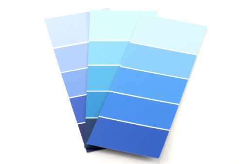 Blue paint color cards on white background