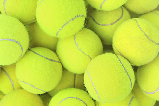 istock Several tennis balls as a background 153014897