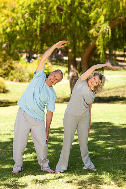 istock Mature couple doing their streches in the park 153015049