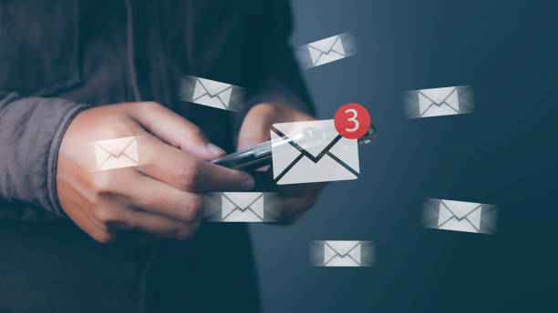 istock Businessman using smartphone with new email notification for business e-mail communication and digital marketing. Inbox receiving electronic message alert internet technology. 1530153656