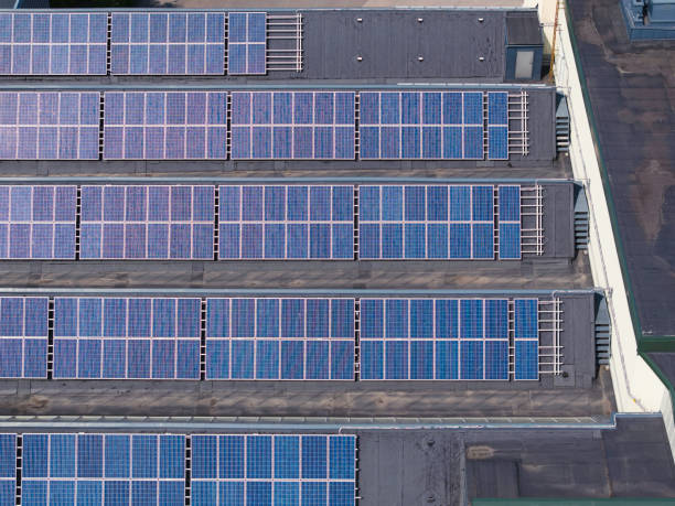 istock Solar panels on the rooftop of an office building 1530158337