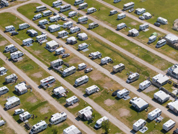 istock Camping site with motor homes in rows 1530158857