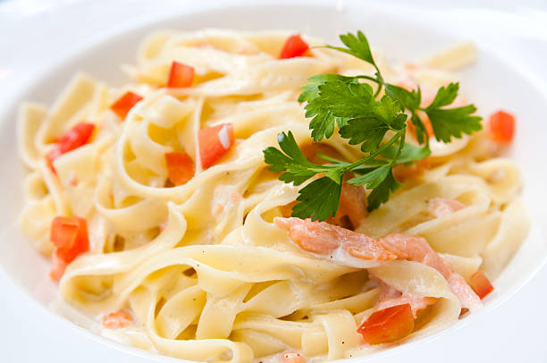 istock tasty pasta with salmon 153017193