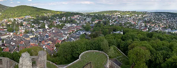 A high resolution panorama of Koenigstein in the Taunus hills, with Frankfurt city in the background and part of the old castle at the bottom of the image.