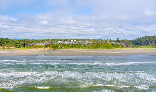 Aerial view of Pacific beach at Seabrook, Washington on a cloudy summer day in June