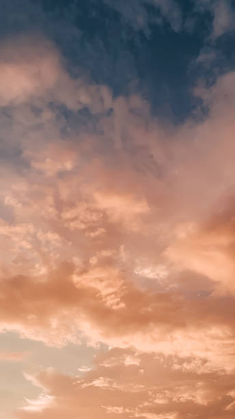 istock Evening sky after sunset in warm colors surrounded by clouds. 1530172247