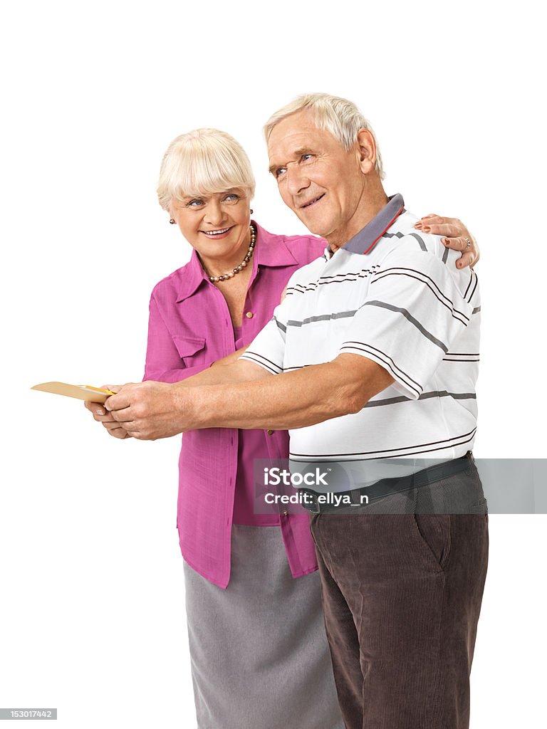 Seniorzy para okazuje kartę - Zbiór zdjęć royalty-free (Aktywni seniorzy)