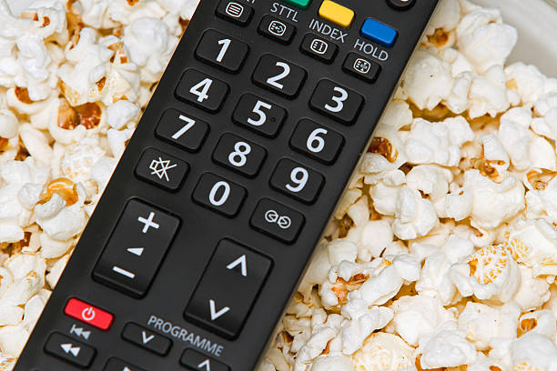 istock TV remote control in a bowl with popcorns 153017734