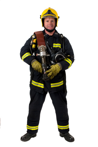 Male uk fire fighter on white background