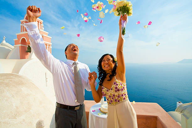 istock Asian couple celebrates wedding in Santorini 153018335