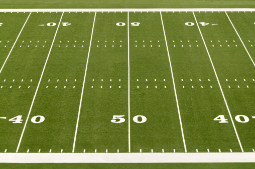 Fifty yard line on American football field.