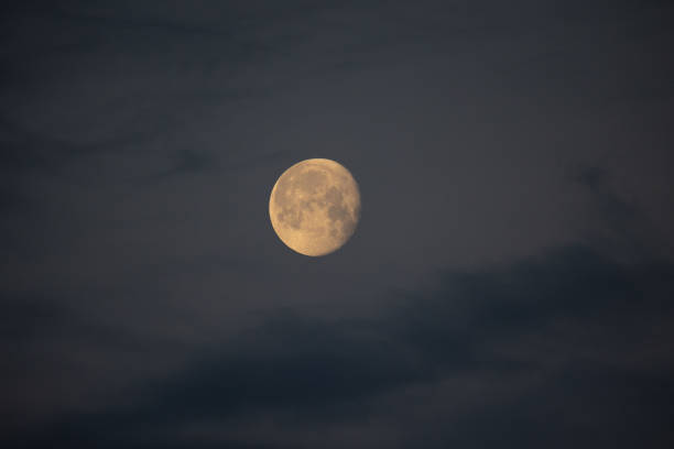 istock Lunar Serenade: Mystical Moon Illuminating the Early Morning Sky 1530187743