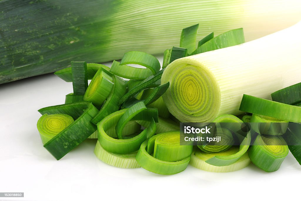 freshly cut leek freshly cut leek on a white background Cooking Stock Photo