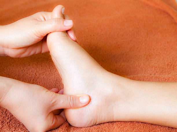 istock reflexology foot massage, spa treatment,Thailand 153018873