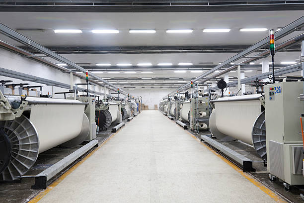 織物石像織りファブリック - textile industry textile textile factory machine ストックフォトと画像