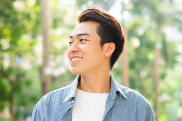 istock Asian man walking on the street 1530213771