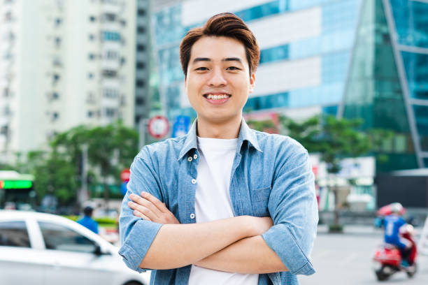 istock Asian man walking on the street 1530213933