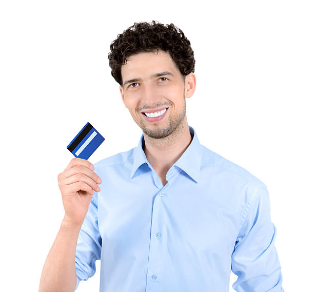 istock Handsome man showing credit card isolated 153029035