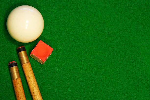 istock billiards table cues and cue ball 153029464