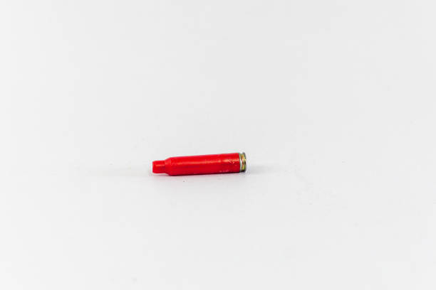 istock Bullet casing, red, isolated on white background 1530302766