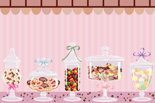Candy jars with chocolates, candies and dragees