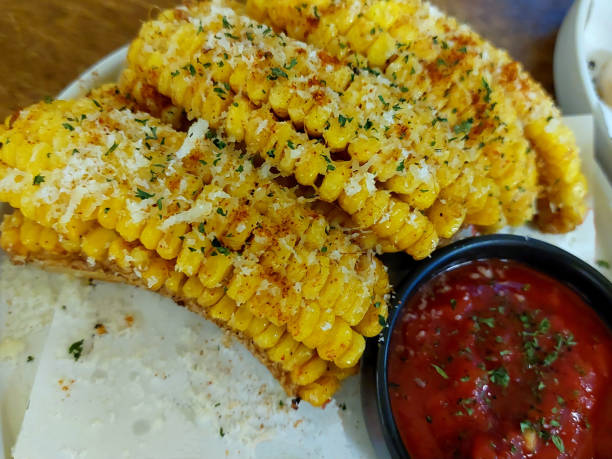 istock Corn ribs with spicy marinara sauce. 1530308307