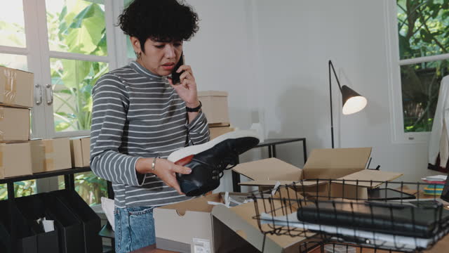 Asian woman is examining her broken online merchandise.
