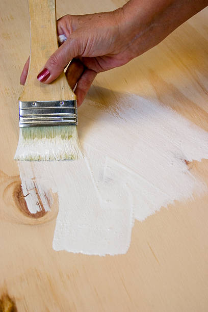 istock Artist Painting Primer to Board 153032300