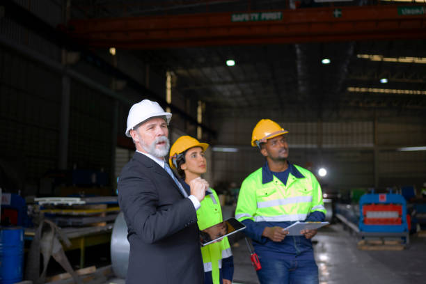 istock Engineer at metal sheet factory. 1530378183
